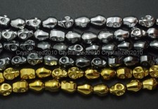 Cuentas espaciadoras de calavera talladas con piedras preciosas de hematita natural metálicas plateadas doradas 15,5"