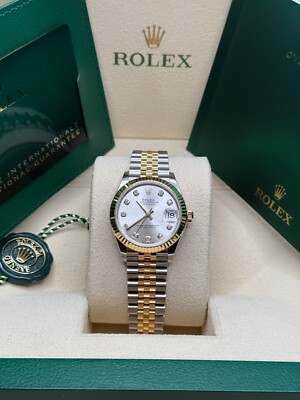 Rolex Datejust 31 NEW 2024 Silver Diamond Dial Two Tone Yellow Gold Fluted Bezel