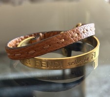 Fendi Gold Plated Interlocking Tan Leather Strap Bracelet With Button Closure
