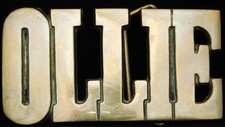 KJ08137 NOS VINTAGE 1970s CUT-OUT NAME  OLLIE  SOLID BRASS BUCKLE