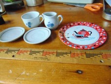 Group of 5 children's dishes- Cup, 2 saucer, pitcher  tin plate