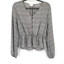 Blusa negra mediana Sienna Sky para mujer con botones delanteros manga larga peplum