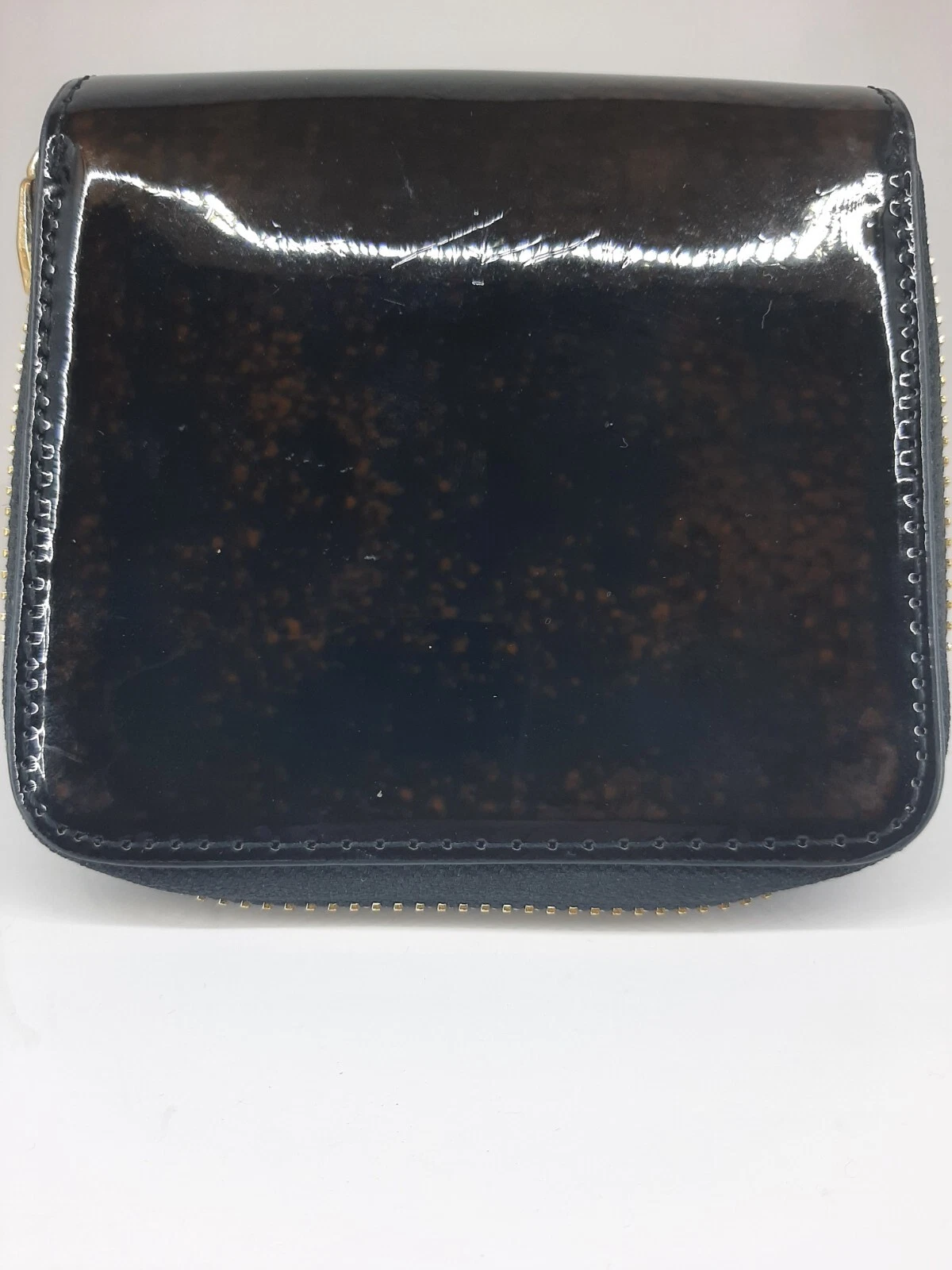 **"Dune London Elegant Black Wallet with Shiny Dots Adds Splendor and Beauty"*