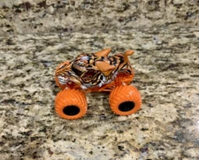 Spin Master Monster Jam CATASTROPHE Tiger Truck New 1:64
