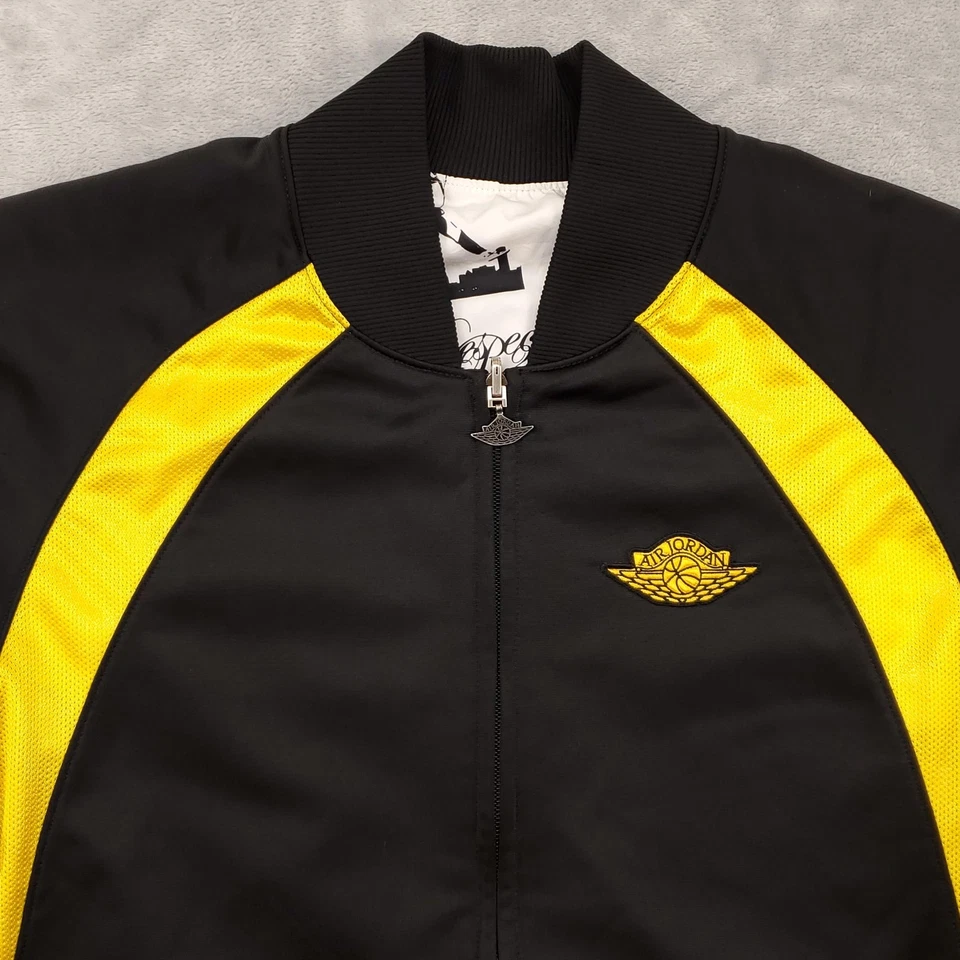 Jaqueta masculina reversível Air Jordan grande preta amarela 1985 Flight Club 217869-010 - Imagem 3 de 4