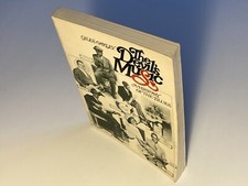 The Devil's Music by Oakley; 1st Softcover Edition, 30+ Photos, Very Good+