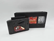 GameShark Pro N64 Video game System & VHS How To Hack Like A Pro