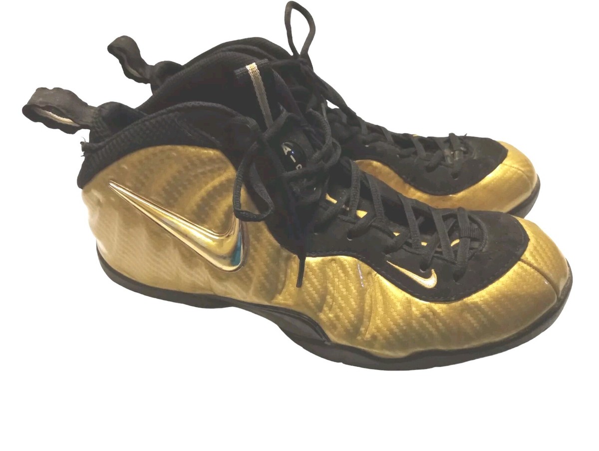 gold nike foams