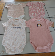 BUNDLE SET OF FOUR NEW MULTICOLORED ONE PIECE BABY BODY SUITS SIZE 6 TO 9 MONTHS
