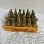 Old Vintage Mini Coca Cola Toy Miniature GOLD Coke Bottles in Plastic Crate
