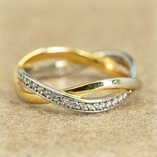 Size 7, vintage two tone Sterling 925 silver entwined ring cluster cz, band