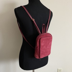 red suede backpack
