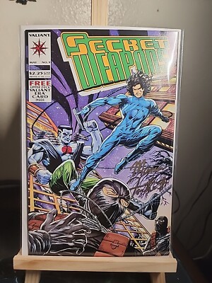 SECRET WEAPONS 9 SIGNED BY MAURICE FONTENOT . 1994 . VALIANT ERA CARD INSIDE. 