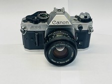 Canon AE-1 Program 35mm SLR Film Camera with Canon FD 50mm F1.8 Lens 1 