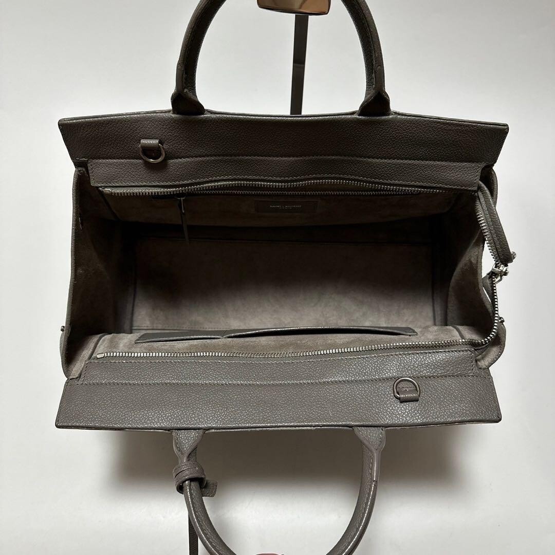 h98 [Buone Condizioni] Viene fornito con borsa portaoggetti Saint Laurent Paris Cavalive Gauche