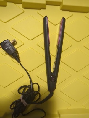 ghd Pink Orchid Limited Edition Styler W/ distinct magenta pink ceramic plates.