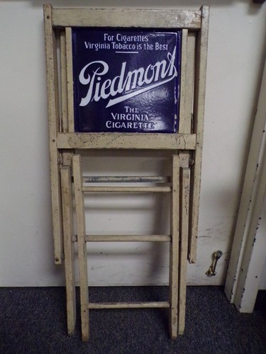 PIEDMONT VIRGINIA TOBACCO CIGARETTES ANTIQUE METAL AND WOOD FOLDING CHAIR