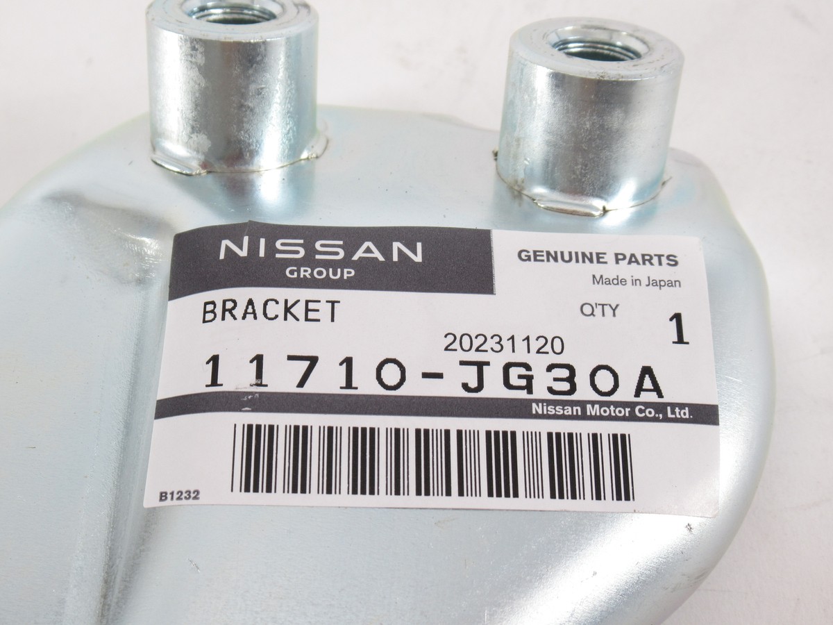 Genuine OEM Nissan 11710-JG30A Alternator Mount Bracket 08-09
