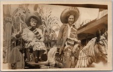 1950s TIJUANA Mexico Photo RPPC Postcard - 2 Ladies on Zebra-Painted Donkey Cart