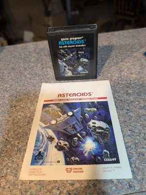 Atari 2600 7800+ Asteroids With Manual  Tested Combine Ship
