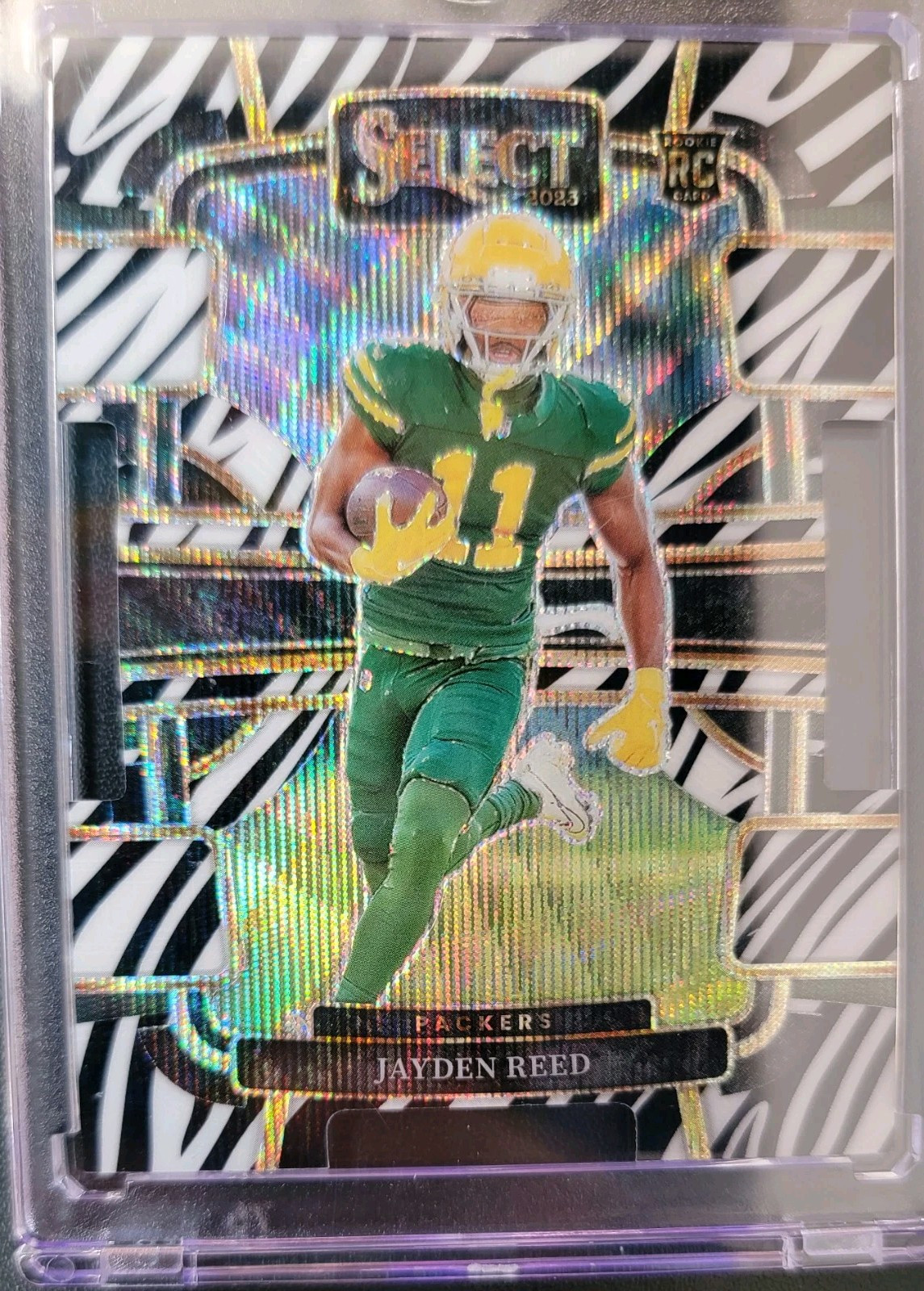 2023 Panini Select Concourse Zebra Prizm Die-Cut #38 Jayden Reed (RC) Packers