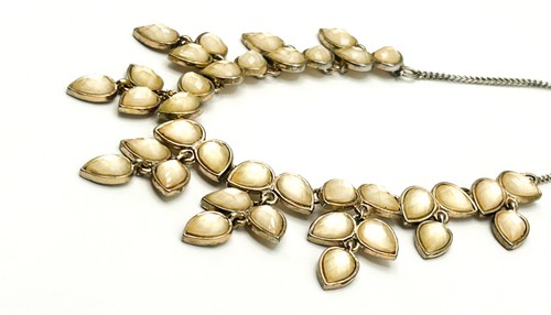 Accessorize Faceted Teardrop Statement Necklace – Champagne Acrylic Leaf Design