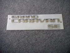 Dodge Grand Caravan SE Emblem Decal Rear Lift Gate OEM 5113415AB