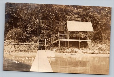 Cottage Grove Higgins Lake MI RPPC Vintage Dock Boathouse Trees