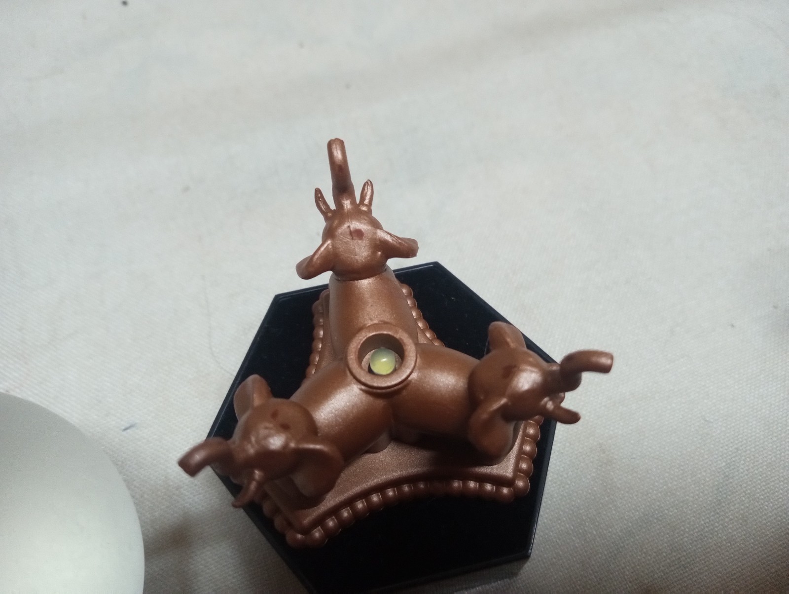 Harry Potter collectible lot, wizarding world trunk orb, pendan, medallion, figu