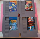 Lot of 4 Vintage NES games (To the Earth, Cybernoid, Super Mario Bros Duck Hunt)