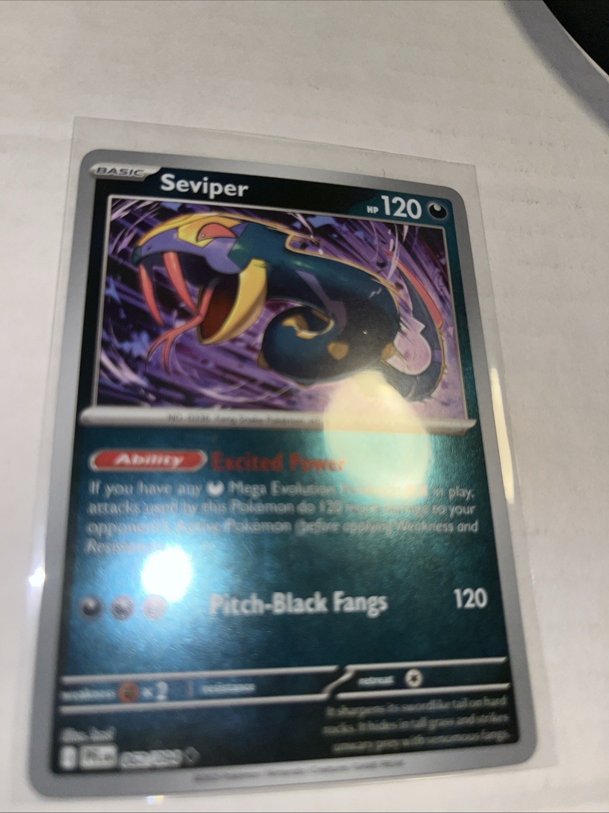 Seviper 062/094 Me02: Phantasmal Flames Reverse Holo