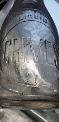 Clear embossed 1 pt.  C. E. Grimes Fredericksburg, Pa. dairy milk bottle. 