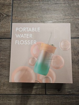 Portable Water Flosser Rechargeable Travel With Multiple Attachments And Charger