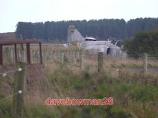 PHOTO  PLANE TIRED PICTURED HERE IN THE FIRE DUMP AREA OF THE WEST FREUGH AIRFIE