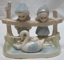 VINTAGE ARTMARK  FIGURINE OF CHILDREN AT FENCE WATCHING SWAN W/ BABIES