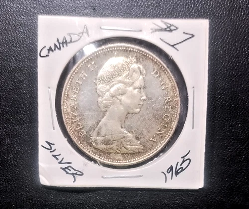 1965 Canada Silver Dollar – Queen Elizabeth II – Canoe – 80% Silver