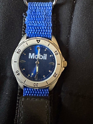 Mobil Quartz Analog Wristwatch Blue Logo Dial Silver Steel Case Blue Strap