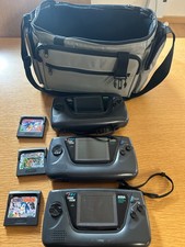 3 x game gear consoles and 3 games