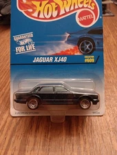 1997 Hot Wheels Collector #609 Jaguar XJ40 Dark Blue Mattel Wheels