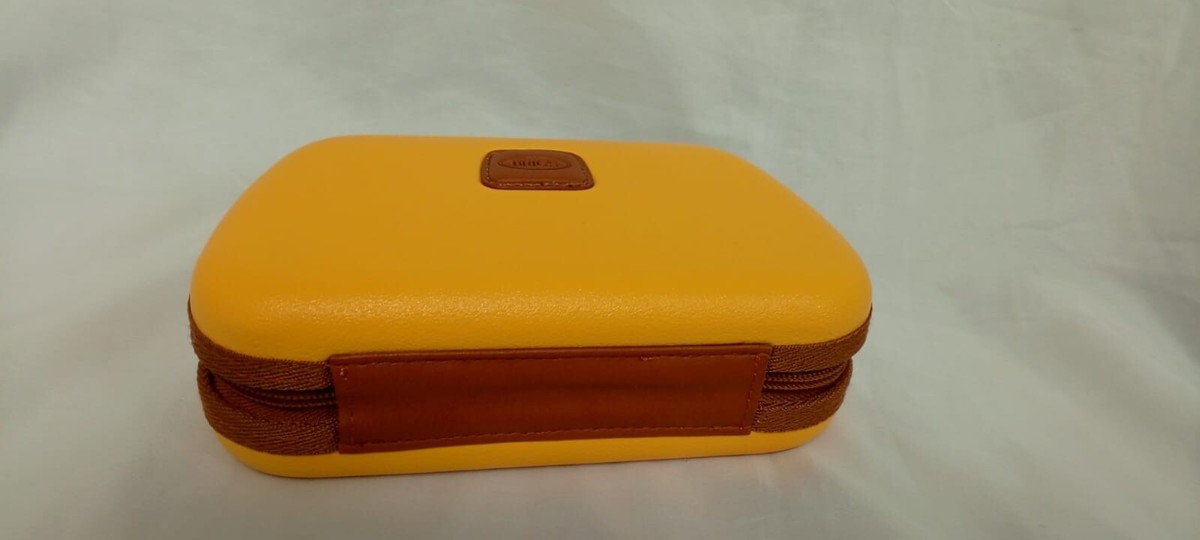 Étui de voyage jaune BRIC’S x Qatar Airways - sac coque