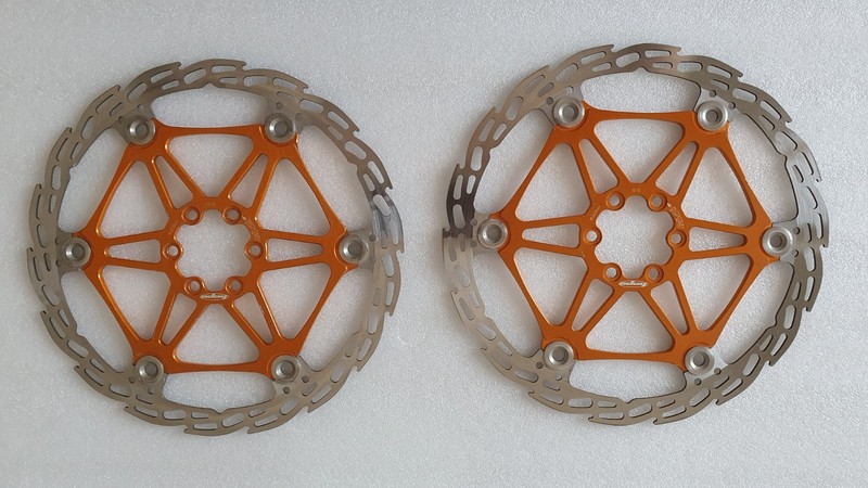 Pair of Vintage 203mm Hope Saw Floating Rotors, 6 Bolt, Anodised Orange