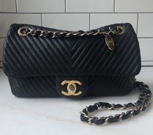 chanel black and gold purse