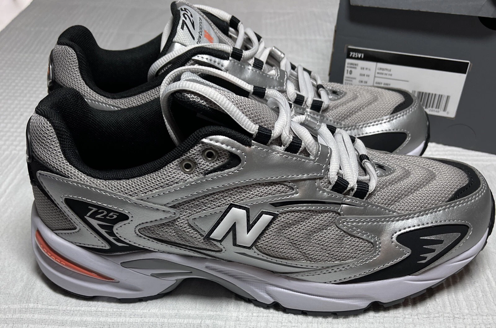 Scarpe New Balance 725 uomo 10 grigio metallizzato nero ML725UB