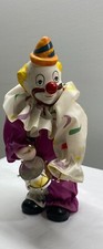 Musical Clown with drum; Porcelain; winds up and works well