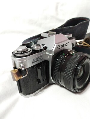 Canon Camera AE-1 35mm With 28mm 1:2.8 FD Lens And New