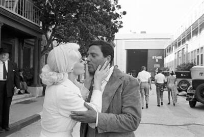 Raf Vallone kissing American actress Carroll Baker on Harlow Holly- Old Photo
