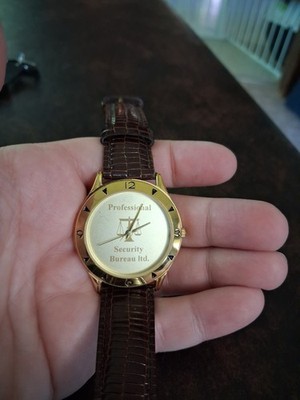 Promotion Watch Professional Security Bureau Ltd Gold Tone Leather Strap