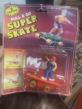 vintage 1987 soma pull and go super skate figure damaged card