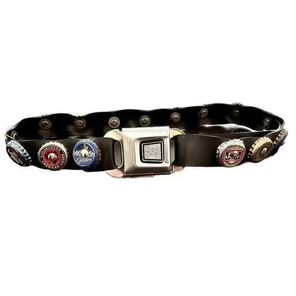A literal beer-cap-shaped seatbelt buckle belt from the 1980s — peak punk Americana and an instant conversation piece.