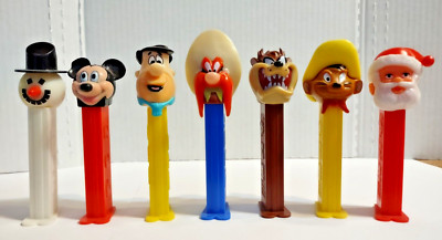 VTg. Lot of 7 Pez Dispensers Snowman Santa Yosemite Sam Mickey Fred F. Tas Speed